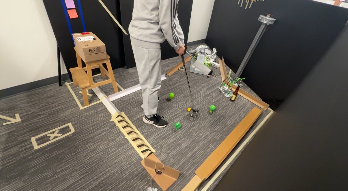 Cardboard and tape prototype of a minigolf hole